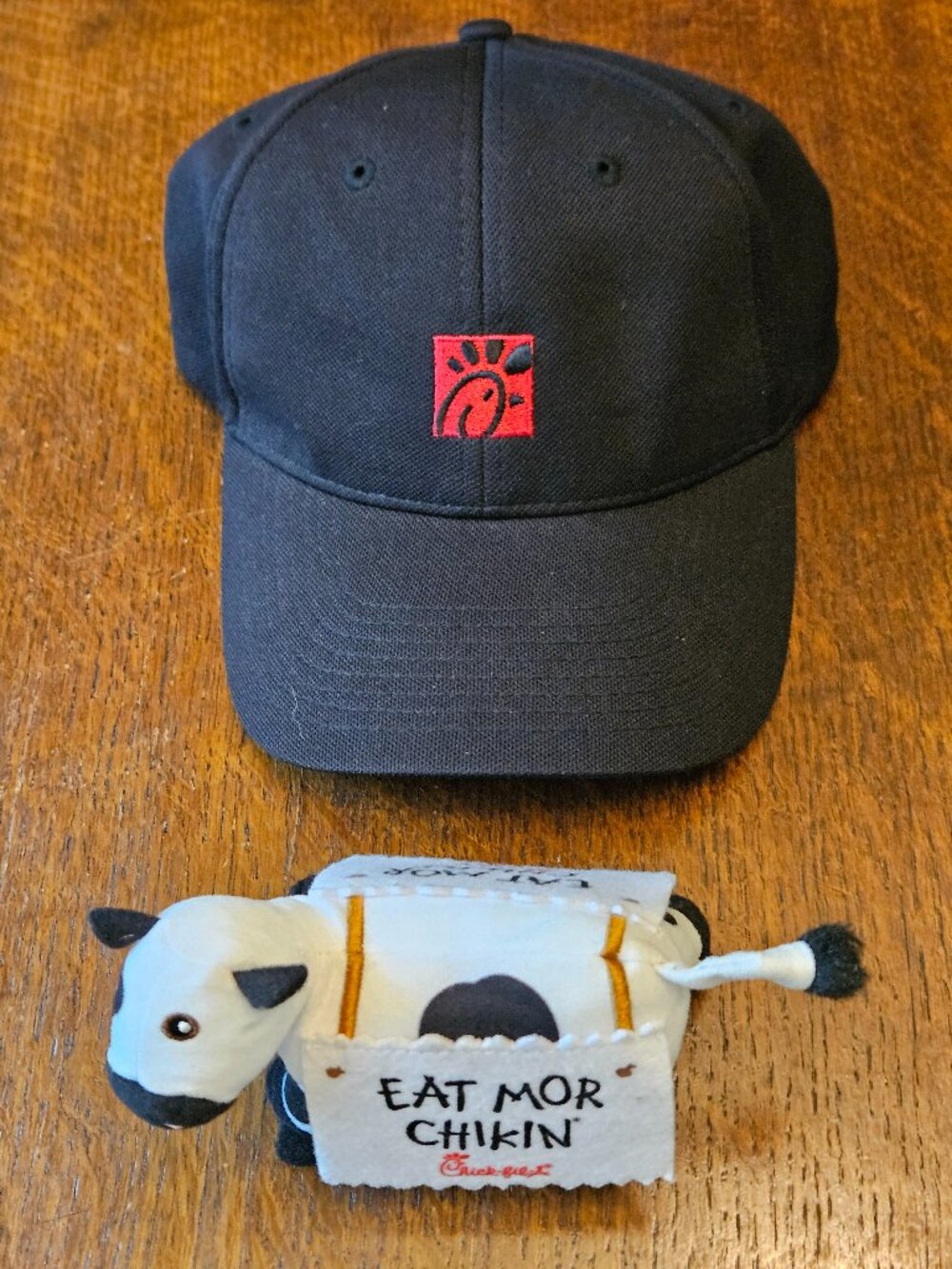 Black Chick-Fil-A Emplyee Hat and Cow Plush